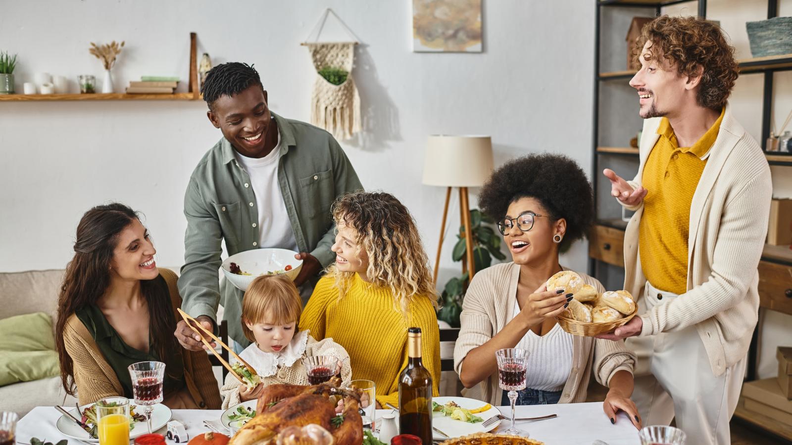 Thanksgiving with friends and family around a feast